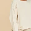 Blusa holgada de algodón de manga larga Abby color hueso